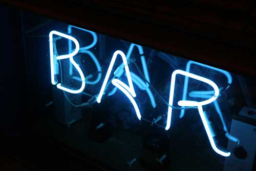 Neon sign spelling B A R